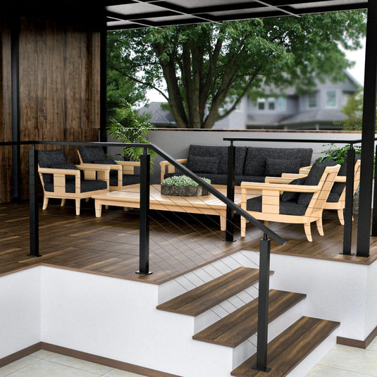A garden with black cable railing installed